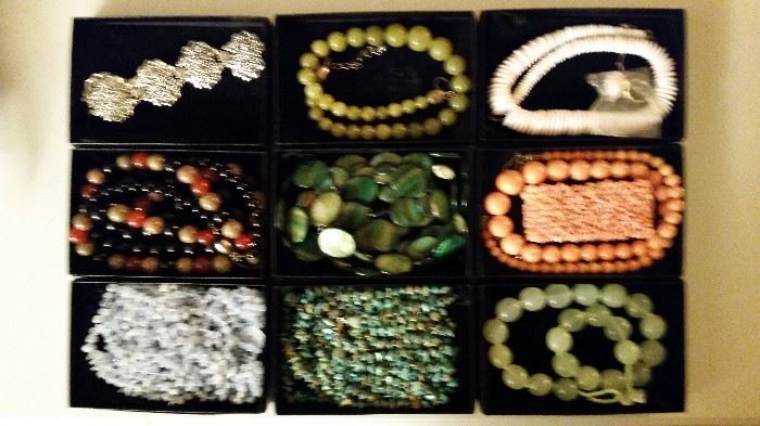 Scores of individually boxed pieces of very affordable costume jewelry, including necklaces, bracelets, pendants, etc.