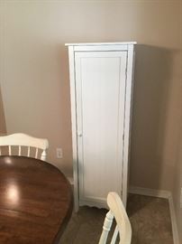 Tall white skinny cabinet