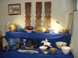 three carved wood panels, pottery by Clyde  Gobble