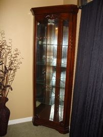 Corner Curio Cabinet, mirrored back, by Howard Miller