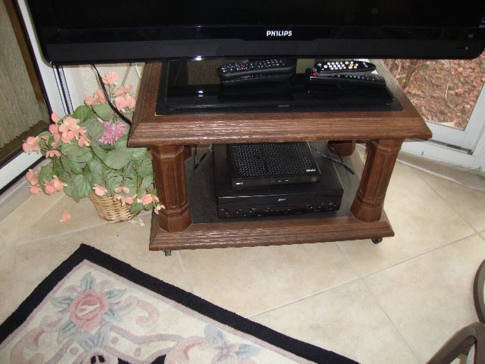 wood square table with glass insert
