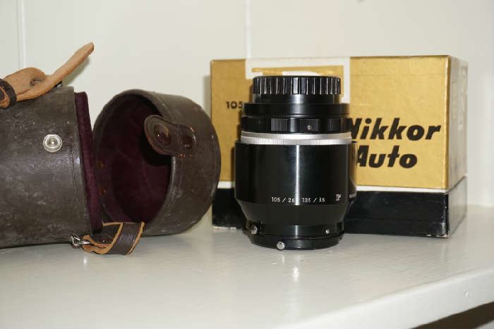 Nikkor lens 105 - 2.5  with original box and carry case 