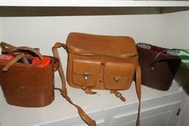 Binoculars and vintage camera bag