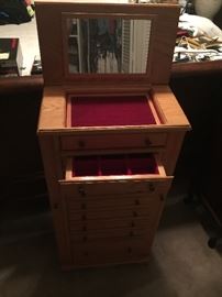 Tall oak jewelry cabinet 