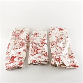 Animal Themed Drapes: A set of drapes. The set includes three matching off-white pole pocket drapes with red imagery of wildlife animals.