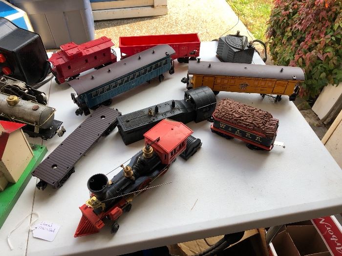 Vintage metal and plastic Lionel train set with track