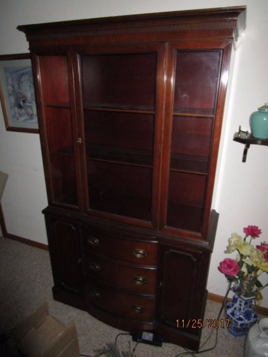 China cabinet matches the side board