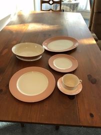 farmhouse style table with dishes