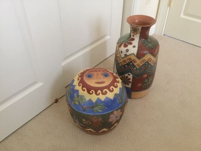 Colorful Peruvian pottery to brighten a corner or spot on the lanai....18 1/2” vase and 11 1/2” whimsical drum with a sun face on top 
