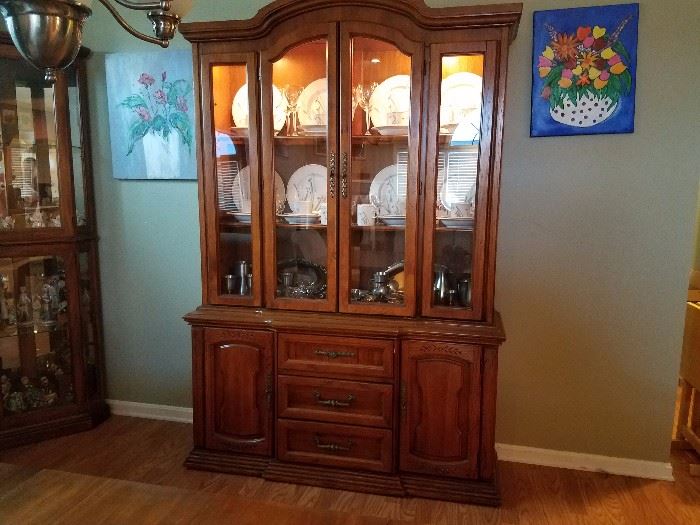 Solid Wood Lighted China Cabinet - Measures 80 inches tall, 54 inches wide and 17 inches deep.