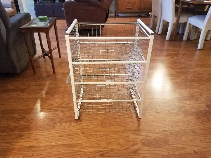 Ikea Wire Rack Storage System.  Multiple units with different rack configurations.  Racks are 17 inches by 21 inches by 28 inches tall.  About 10 racks at the sale.