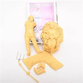 Creature Arts Model Kit of Kevin McCarthy in Invasion of the Body Snatchers; A model kit. The model kit depicts a scene from the 1956 film, Invasion of the Body Snatchers starring Kevin McCarthy. It was manufactured by Creature Arts and was sculpted by S. M. Clark. It includes its original packaging. It includes a certificate of authenticity and assembly instructions.