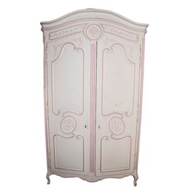 Painted Louis XV Style Provincial Armoire By Henredon: Painted Louis XV style provincial armoire. This armoire with a domed bonnet top and cabriole legs is painted white with soft pink highlights on the raised decoration on the two doors, which open onto an interior fitted with four linen drawers below eight large cubby holes under a shelf. Marked Four Centuries Henredon inside of drawer.