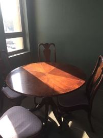 Nice round table with 4 chairs