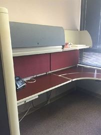 One of many metal cubicle office units