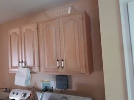 Solid wood laundry room cabinets (match kitchen cabinets)