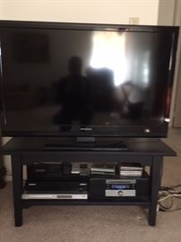 Insignia 40" TV, CD player, DVD player, Stand