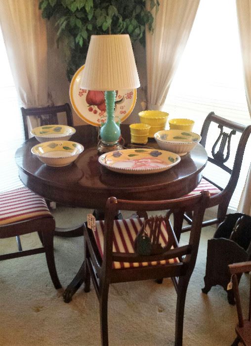 Round claw foot table (leaves included), Lyre chairs, Italian pottery, Murano lamp