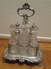 WOW!  CIRCA 1850'S this HENRY WILKINSON & CO. antique English Sterling Silver cruet set is a family heirloom!!  It was so carefully wrapped when found, there is NOT A TRACE of tarnish on this  beauty.  Every jar and stopper (including sterling spoons) are also in perfect condition!  DO NOT MISS THE OPPORTUNITY TO MAKE IT YOURS! 
