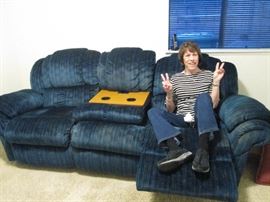 So 70's (and so bad it's good!!) Peace and Love velveteen recliner (only one works now...oh well), with built-in cup holders and phone jack.  Perfect for a teen-age "man" cave....what could happen to it?? Note: Homeowner is NOT included!!  :)