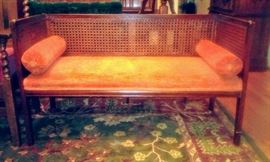 Lovely Mid-Century "Cane" Bench with lovely orange velvet upholstery.