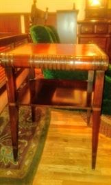 Lovely antique red leather-top mahogany side table.