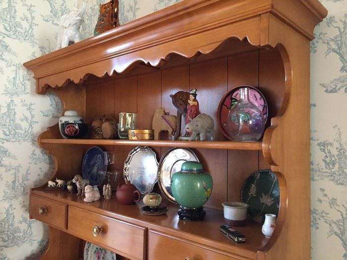 China Cabinet with assorted accessories.