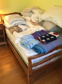 Twin Bed with Blankets and Sheets.