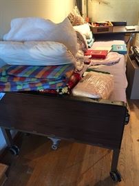 Hospital Bed and assorted linens.
