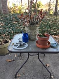 Patio furniture and Pots.