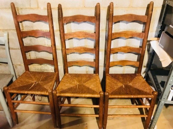 Three Wood Cane Chairs.