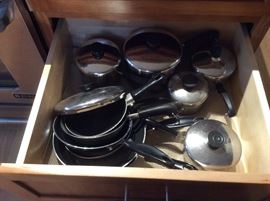 lots of nice stainless pots and pans