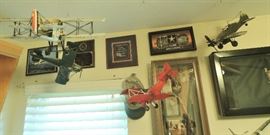 Military and man cave signs. Plans and helicopters. Gun display case