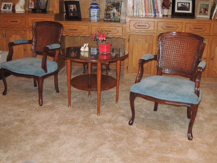 vintage 50s / 60s cane back arm chairs.  Round tier 50s end table