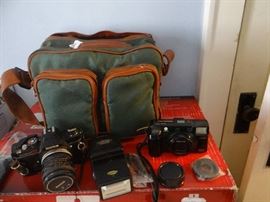 Konica Autorefly T.C. Camera and a Minolta Camera.