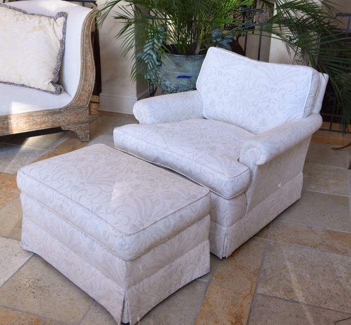 UPHOLSTERED LOUNGE CHAIR AND OTTOMAN