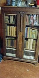 1800's books and Bookcase glass front doors