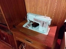 Vintage Singer sewing maching and cabinet