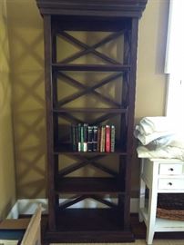 One of a pair of contemporary mahogany bookshelves - hey good lookin'! They measure 2' 4" W x 1' D x 6' 6" T.