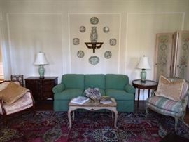 SO, here's the deal on this room.                                               The green upholstered couch is by Sherrill, the upholstered French bergere chair is unknown (recovered) Italian Florentine coffee table, vintage hand painted 4-panel screen, vintage French marble topped guéridon side table, vintage French commode, vintage exposed wood toile armchair, nice collection of Asian rose medallion plates, vintage wooden sconce, urn, from the Kuang Hsu Dynasty (1875-1908), all atop an antique 10' x 14' Lavar Kerman Persian rug, from House of Persia; original cost was $14,500.                                                                                      I have the receipt.                                                                            Don't hate!