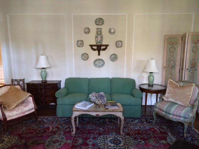 SO, here's the deal on this room.                                               The green upholstered couch is by Sherrill, the upholstered French bergere chair is unknown (recovered) Italian Florentine coffee table, vintage hand painted 4-panel screen, vintage French marble topped guéridon side table, vintage French commode, vintage exposed wood toile armchair, nice collection of Asian rose medallion plates, vintage wooden sconce, urn, from the Kuang Hsu Dynasty (1875-1908), all atop an antique 10' x 14' Lavar Kerman Persian rug, from House of Persia; original cost was $14,500.                                                                                      I have the receipt.                                                                            Don't hate!