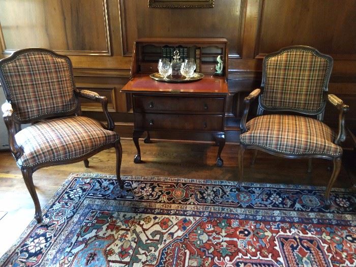 Very handsome pair of French bergere armchairs, with an antique English mahogany drop-front writing desk. 