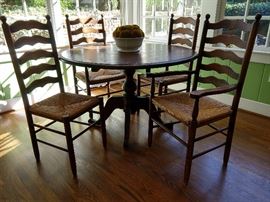 Here's the vintage pine table and four chairs - two sides & two arms; measures 48" diameter and purchased from Nottingham Antiques, on Bennett St.,  back in the day. 