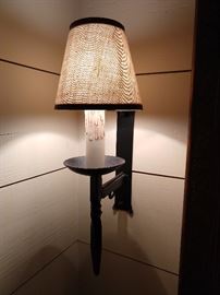 One of a pair of vintage, cast iron wall sconces.