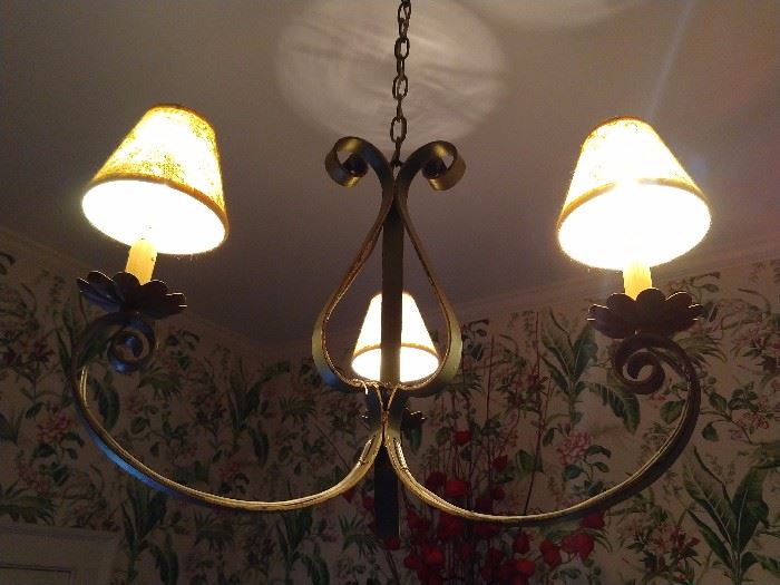 Another sweet wrought iron chandelier for your love nest. This one is prone to 3-ways. EEEK! Grab your waaf, hide your chirrens!