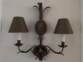 Another lovely pair of vintage, wrought iron wall sconces. This one with the oh-so-suthun pineapple theme that means you be so welcome in our trailer.