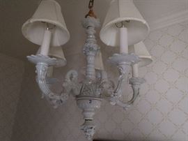 Check out this vintage, Italian Capodimonte chandelier! The PERFECT white porcelain fixture for the entry powder room, or to light up the world of your little princess.                                                                                                  This will not lead to transie children, don't worry. 