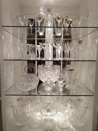A deep collection of Lalique "Phalsbourg" stems. This is part of a large set of "Phalsbourg" stemware, (red & white wines, champagne coupés & cordials) + a matching decanter and pitcher. You're also looking at American Brilliant Cut Glass bowls and punch bowl, Waterford, Gorham and Czech crystal items. I know, I know, you're a crow and LOVE sparkly things, like me!