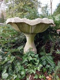 Fun little elevated concrete sitzbath for your avian friends.