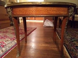 Side view of the antique French side table, so you can see the intricate inlay.